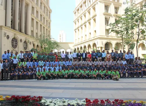 Group photo featuring a diverse team of security, safety, and support staff at the workplace.