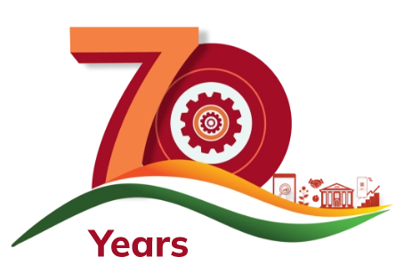 70th anniversary emblem with a gear icon inside the number zero, featuring a tricolour wave in green, white, and orange on an orange background.