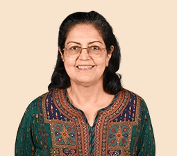 Portrait of Vibha Paul Rishi, Independent Director at ICICI Bank, wearing a traditional green outfit with an embroidered design, representing her role and leadership within the bank.